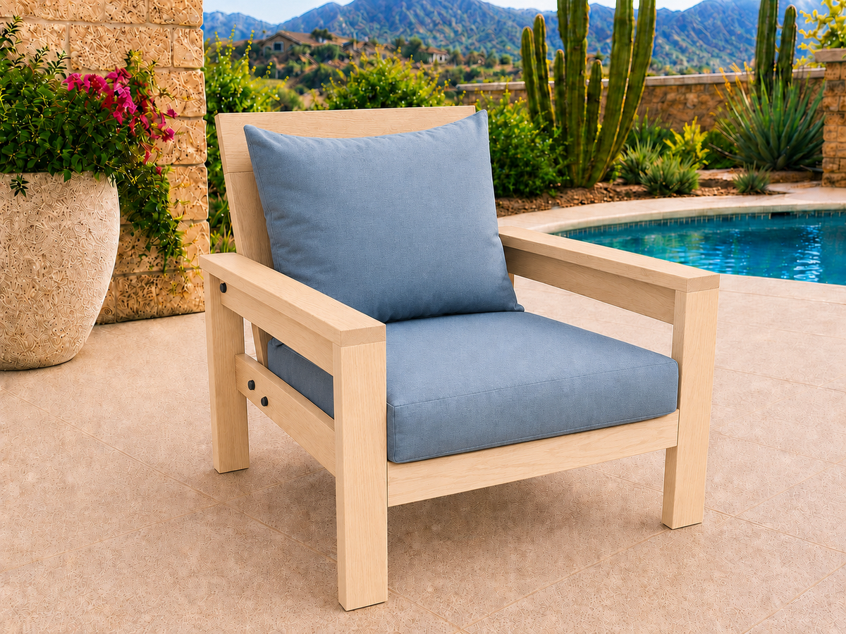 Classic Chair in Hard White Maple with Natural Satin finish and blue cushions on a desert patio.