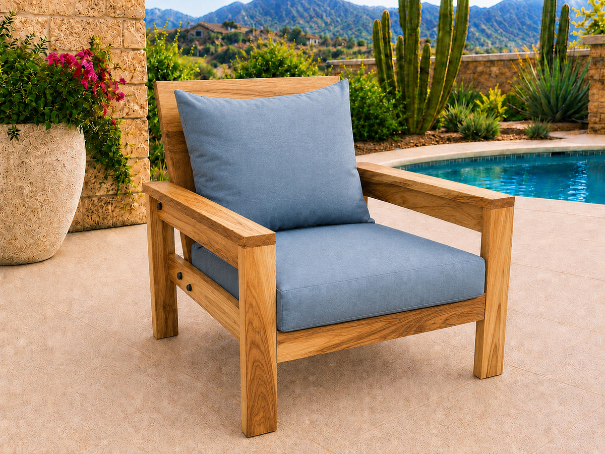 Classic Chair in Natural Hickory with Light Honey finish and blue cushions on a desert patio.
