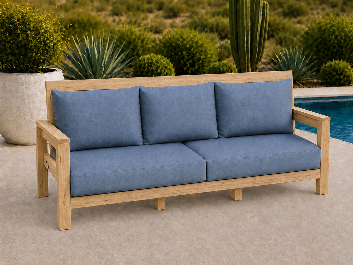 Classic Sofa in Natural Hickory with Light Honey finish and blue cushions on a desert patio.