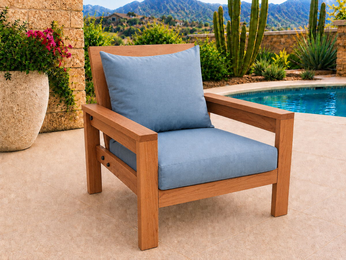 Classic Chair in Cherry with Natural Satin finish and blue cushions on a desert patio.