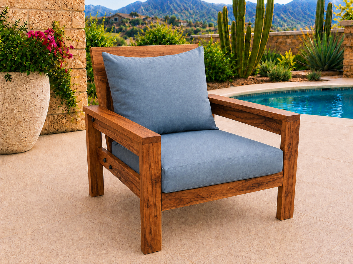 Classic Chair in Mesquite with Natural Satin finish and blue cushions on a desert patio.