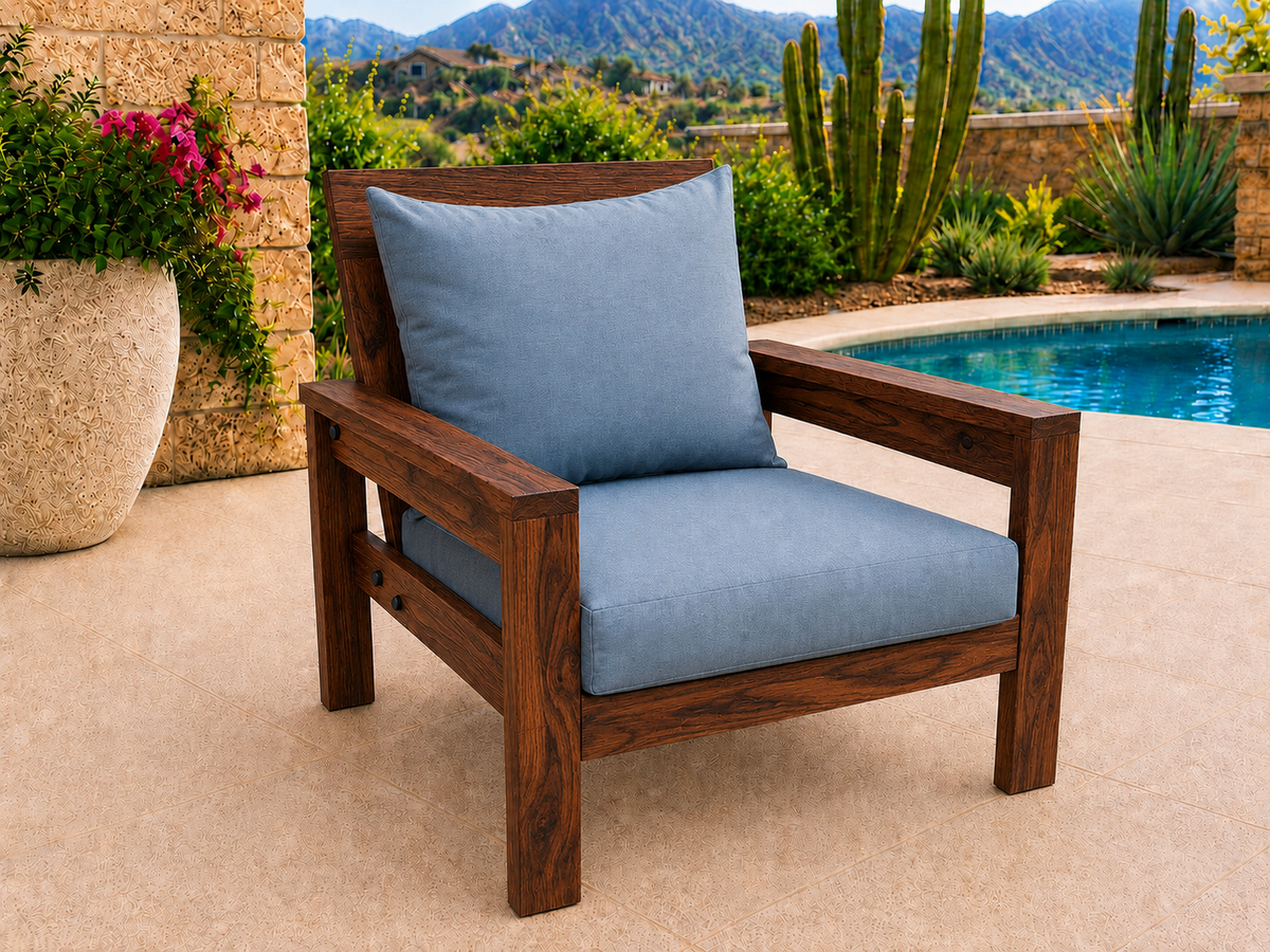 Classic Chair in Mesquite with Walnut Reserve finish and blue cushions on a desert patio.