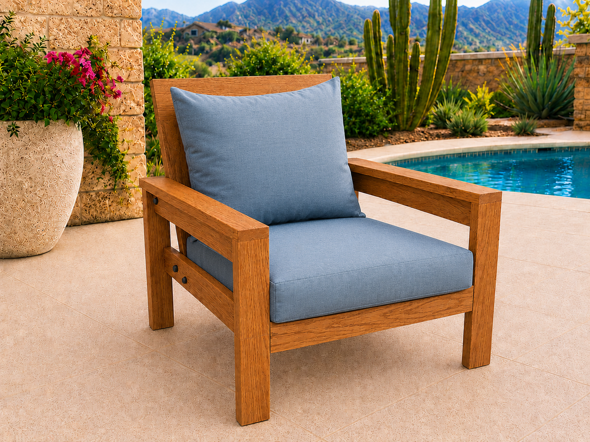 Classic Chair in Red Oak with Canyon Honey finish and blue cushions on a desert patio.