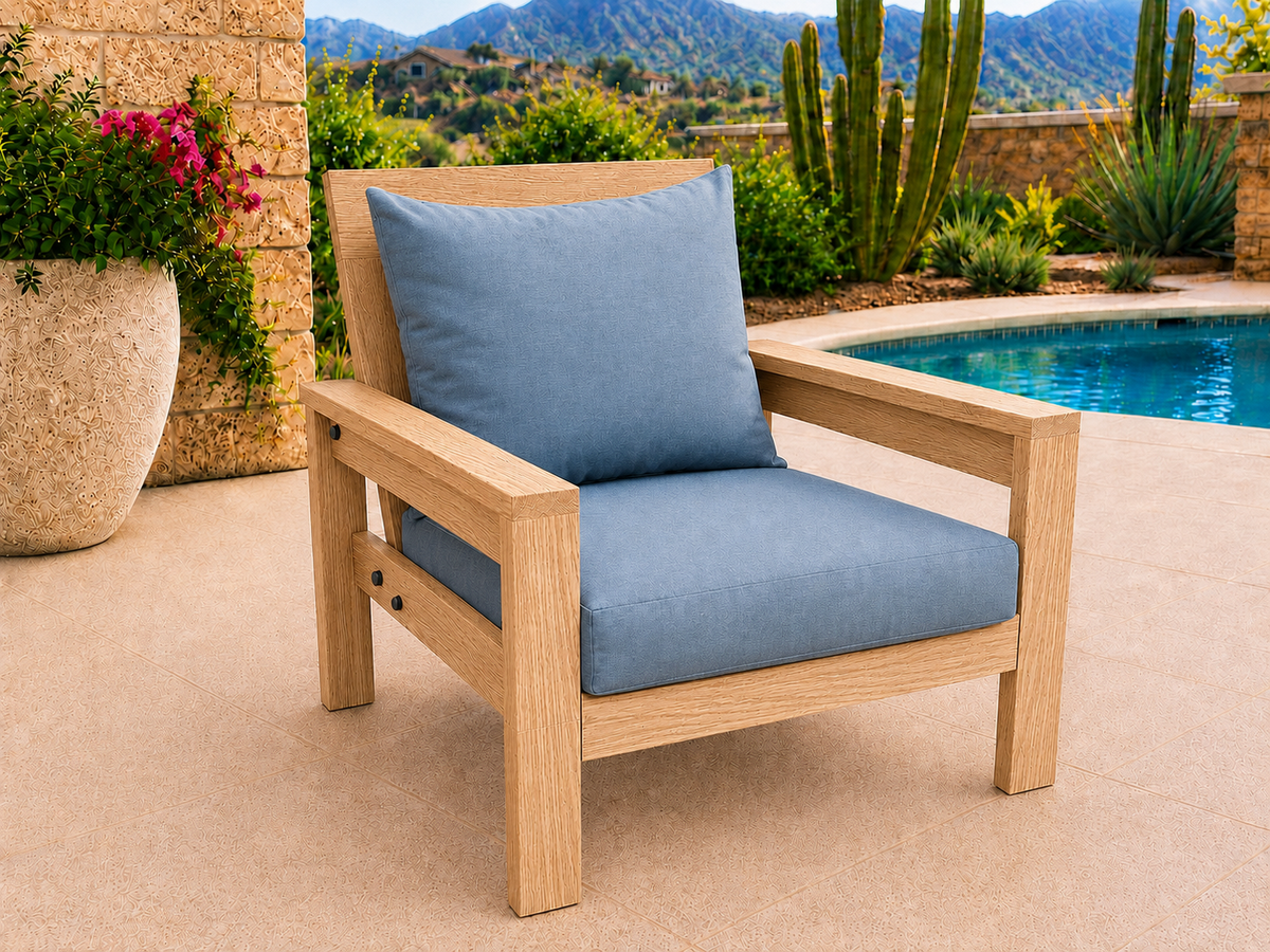 Classic Chair in White Oak with Natural Satin finish and blue cushions on a desert patio.