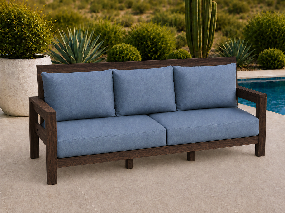 Classic Sofa in Wenge with Satin Clear finish and blue cushions on a desert patio.